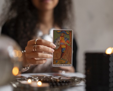 front-view-woman-reading-tarot