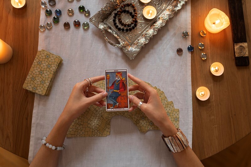 top-view-woman-reading-tarot (3) (1)